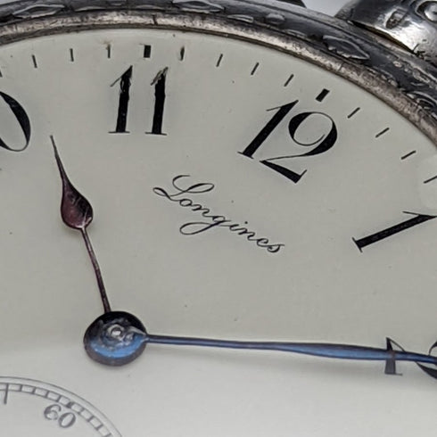 Around 1906 Antique Longines pocket watch silver side open face works well